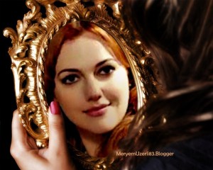 meryem_uzerli-beautiful girl in looking at mirror